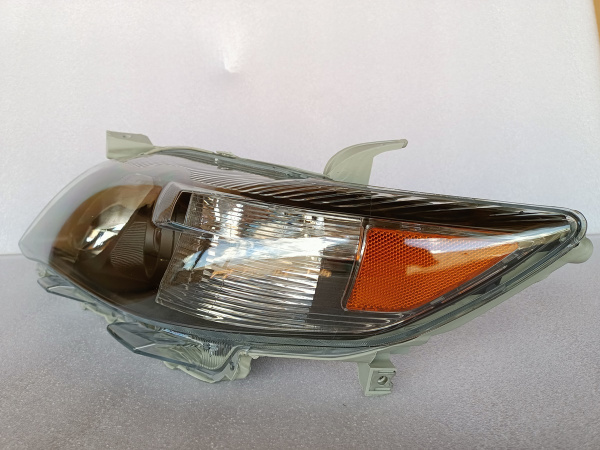 Фара темная левая Toyota Camry 2009-2011