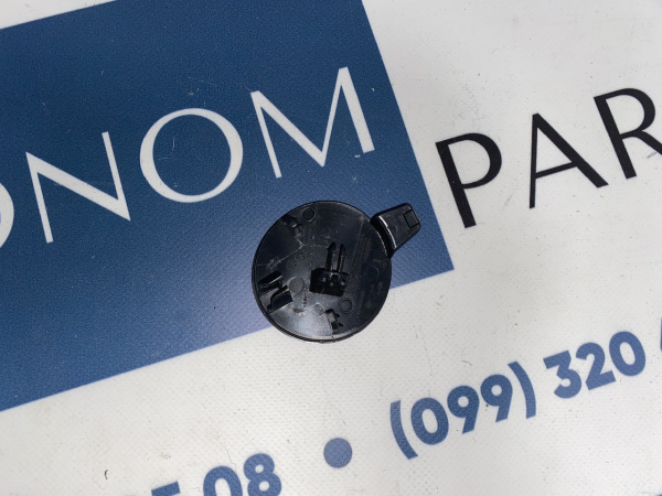 1493746-00-A Заглушка буксировочного крюка переднего бампера Tesla Model Y 2020-2024