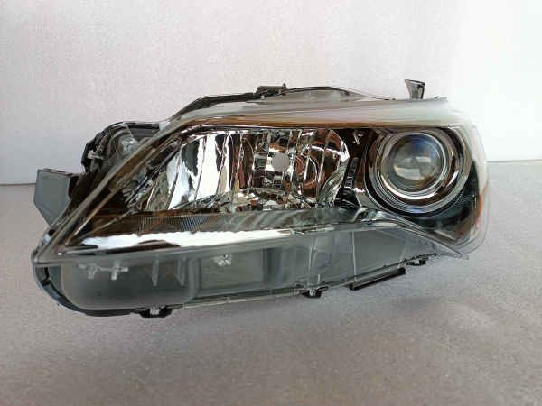 8115006C70 Фара темная LE левая Toyota Camry USA 2015-2017