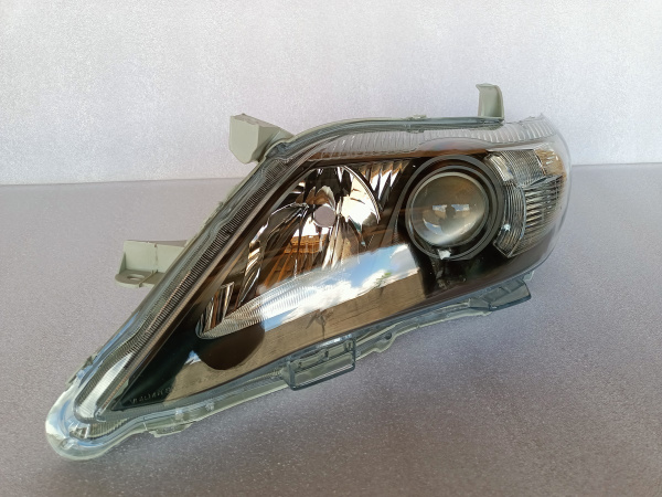 Фара темная левая Toyota Camry 2009-2011