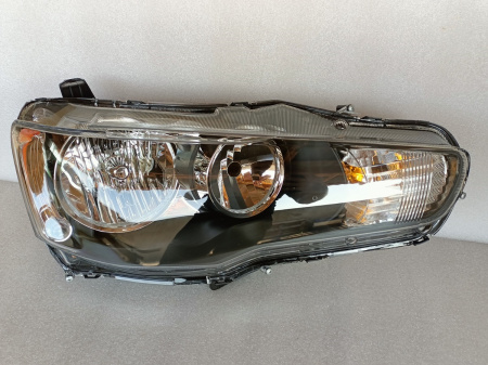 8301B407 Фара правая галоген черная на Mitsubishi Lancer 10