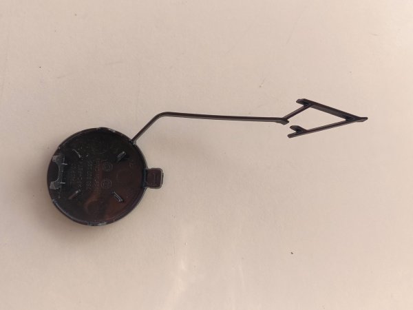 760807155GRU  Заглушка крюка переднего бампера левая Volkswagen Touareg 2019 -